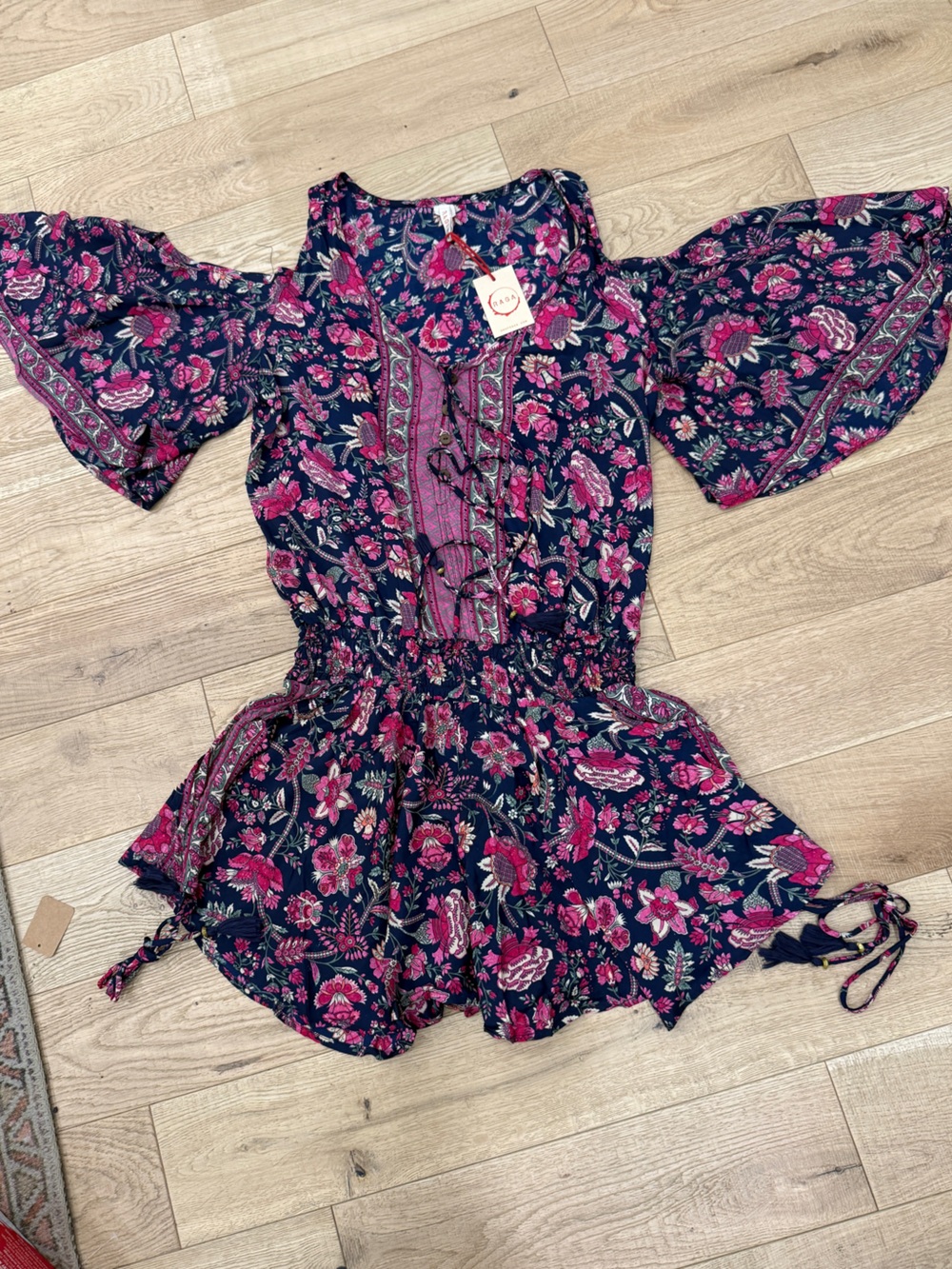 RAGA Anthropologie Cold Shoulder Romper with Buttons, Tassels, and Ties